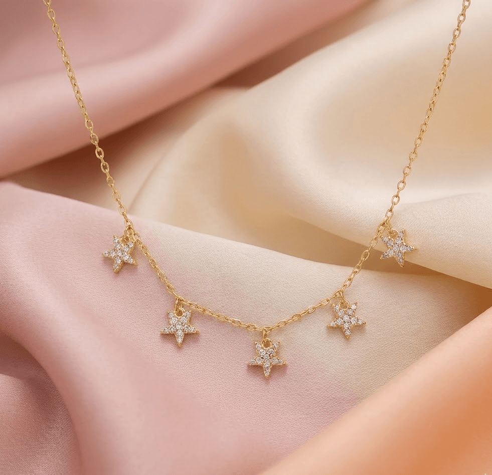 Grandinėlė su žvaigždučių pakabukais (medicininis auksas)